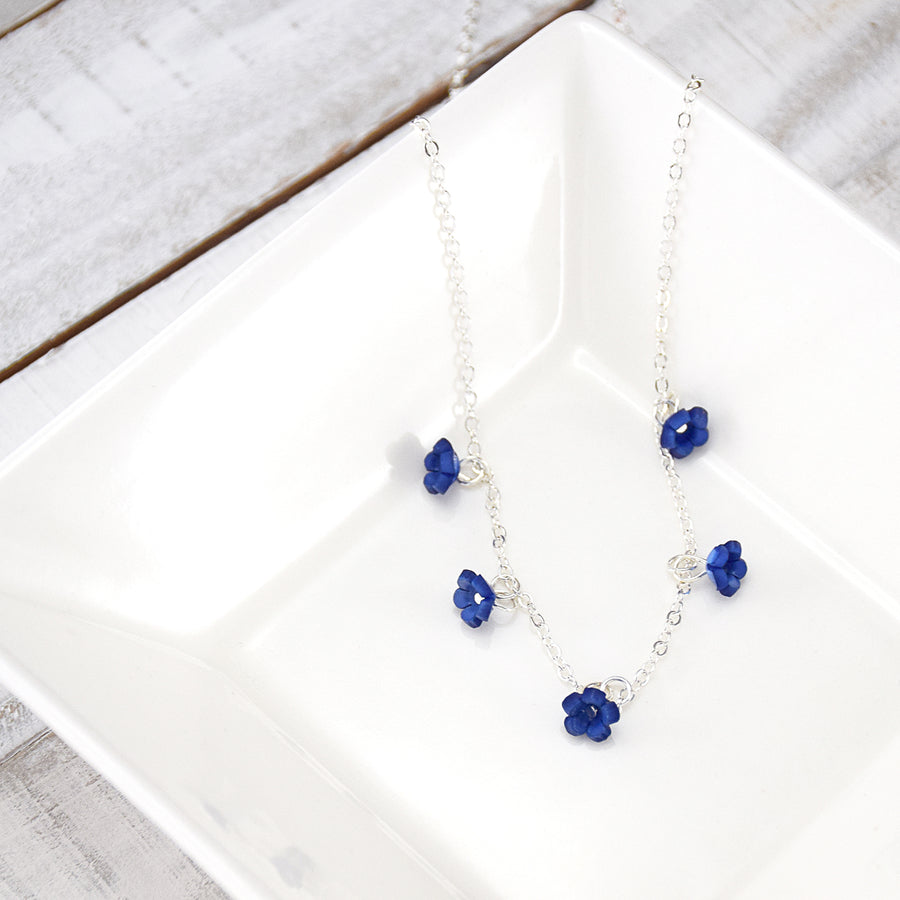 Dainty Flower Charm Necklace - Blue flowers on a silver finish chain